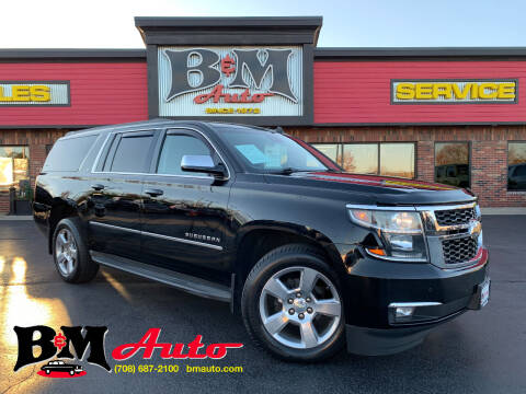2015 Chevrolet Suburban for sale at B & M Auto Sales Inc. in Oak Forest IL