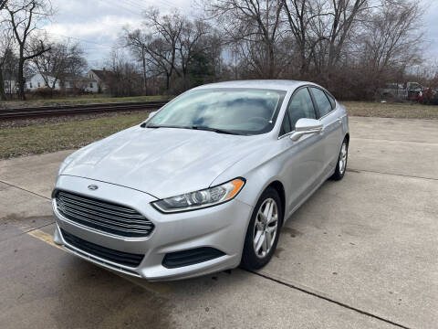 2014 Ford Fusion for sale at Mr. Auto in Hamilton OH