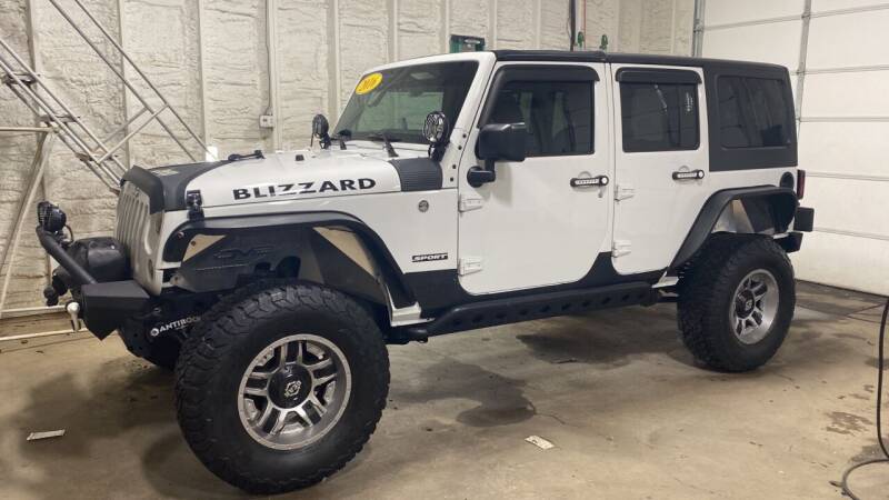 2016 Jeep Wrangler Unlimited for sale at Butler's Automotive in Henderson KY