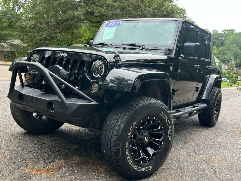2012 Jeep Wrangler Unlimited for sale at El Camino Auto Sales - Roswell in Roswell GA