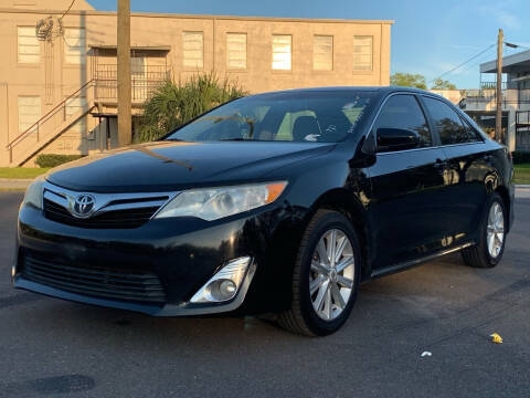 2012 Toyota Camry for sale at LUXURY AUTO MALL in Tampa FL