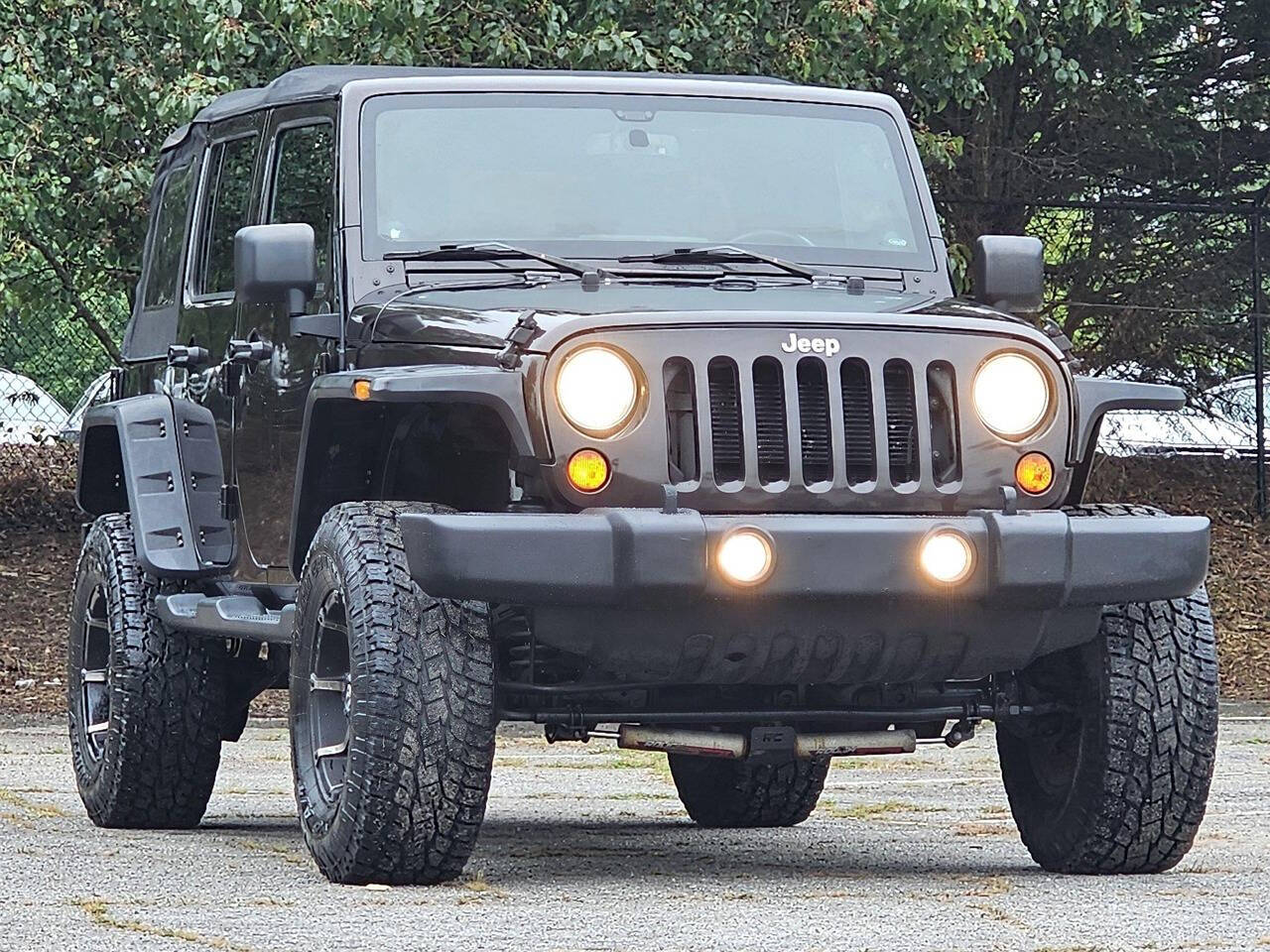 2013 Jeep Wrangler Unlimited for sale at 123 Autos in Snellville, GA