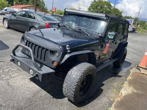 2012 Jeep Wrangler Unlimited for sale at Cars 2 Go, Inc. in Charlotte NC
