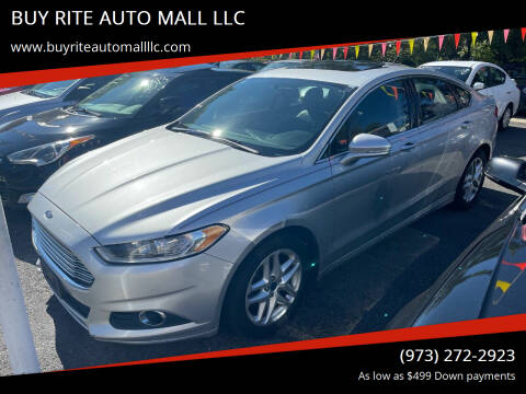 2014 Ford Fusion for sale at BUY RITE AUTO MALL LLC in Garfield NJ