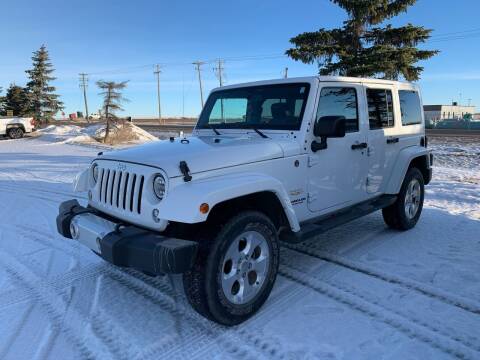 2015 Jeep Wrangler Unlimited for sale at Truck Buyers in Magrath AB