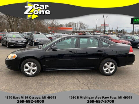 2013 Chevrolet Impala for sale at Car Zone in Otsego MI