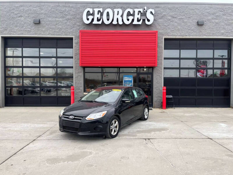 2014 Ford Focus for sale at George's Used Cars in Brownstown MI