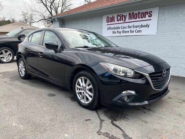 2015 Mazda MAZDA3 for sale at Oak City Motors in Garner NC