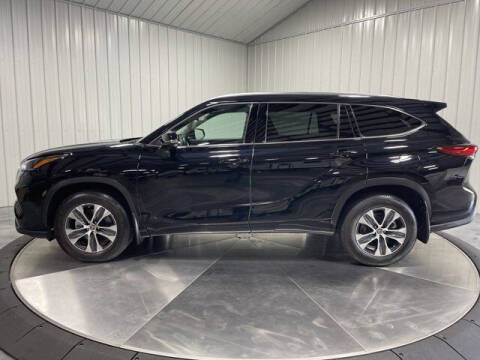 2021 Toyota Highlander for sale at HILAND TOYOTA in Moline IL