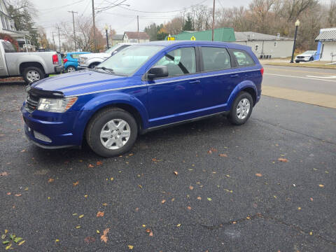 2012 Dodge Journey for sale at Maximum Auto Group II INC in Cortland OH