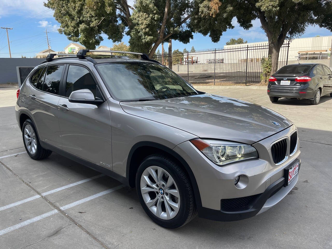 2014 BMW X1 for sale at Super Auto Sales Modesto in Modesto, CA