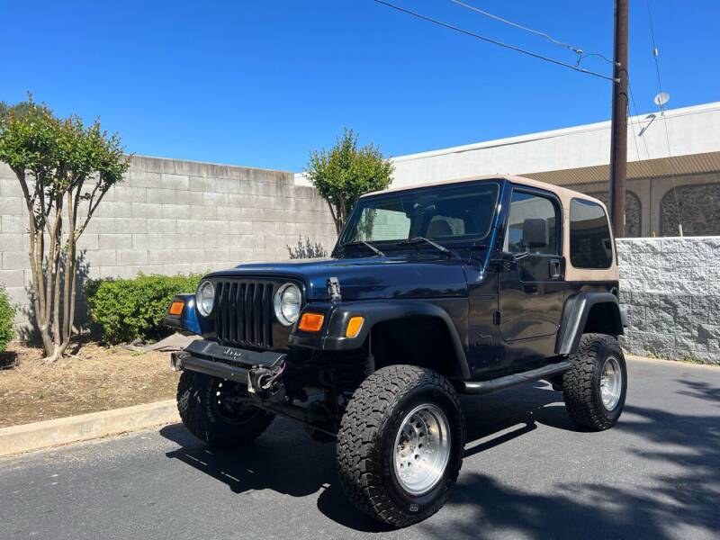 2002 Jeep Wrangler for sale at Excel Motors in Fair Oaks CA