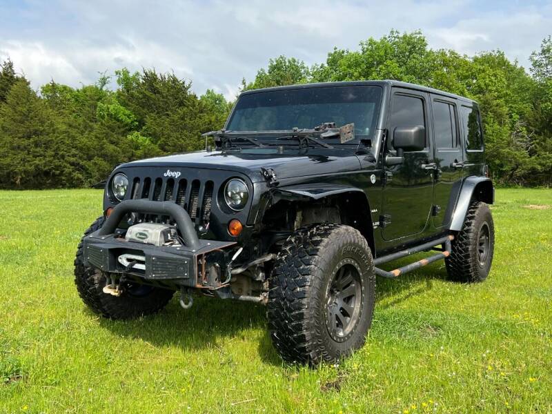 2012 Jeep Wrangler Unlimited for sale at TINKER MOTOR COMPANY in Indianola OK