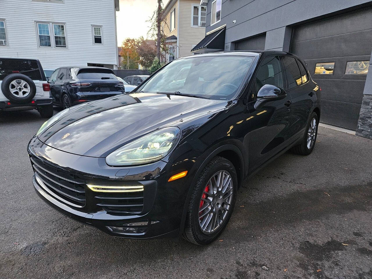 2015 Porsche Cayenne for sale at RENOS AUTO SALES LLC in Waterbury, CT