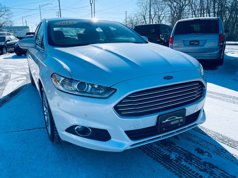 2013 Ford Fusion Hybrid for sale at SHEFFIELD MOTORS INC in Kenosha WI