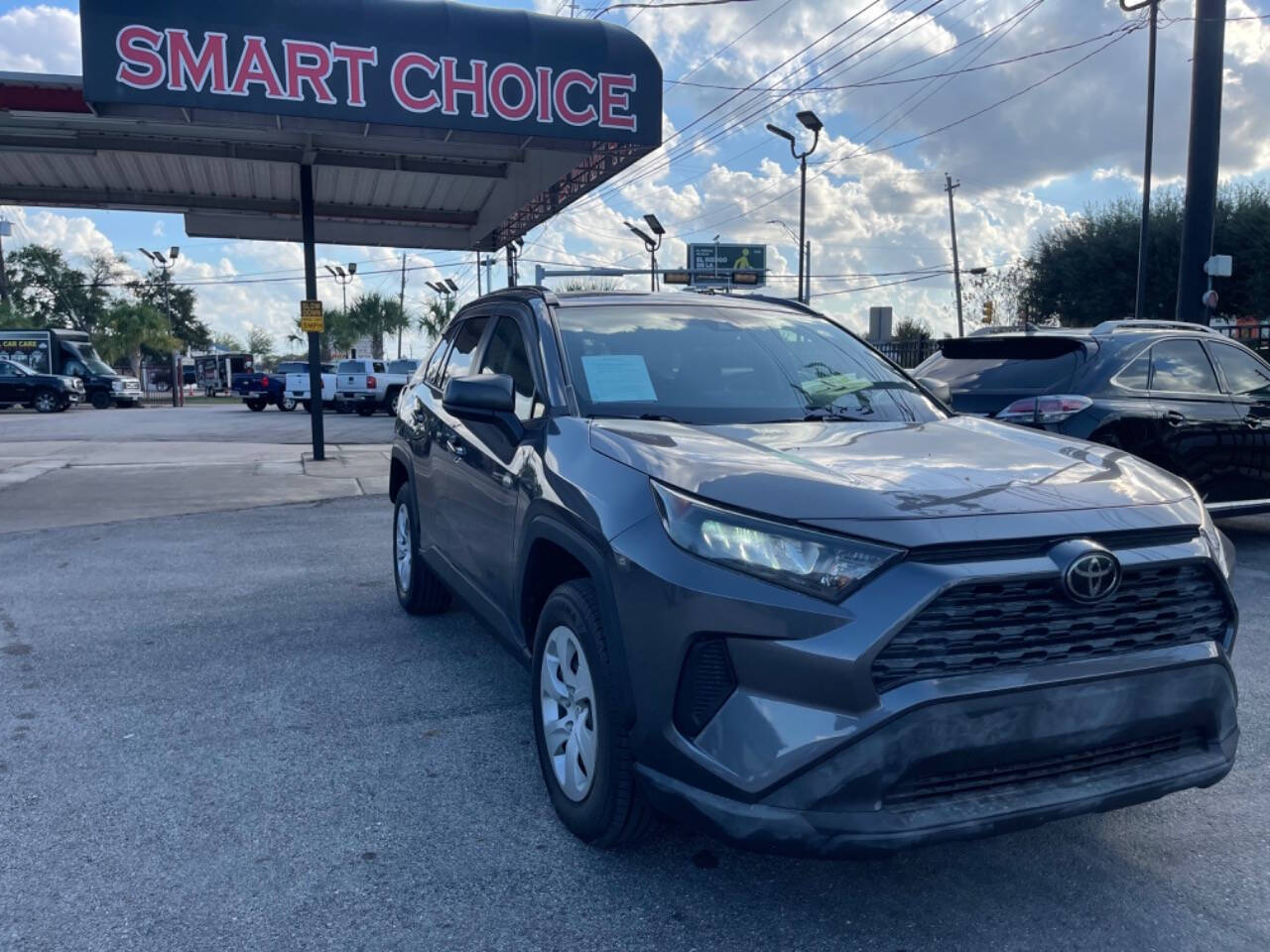 2019 Toyota RAV4 for sale at SMART CHOICE AUTO in Pasadena, TX