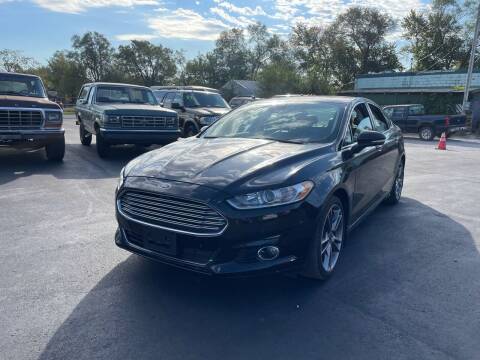 2013 Ford Fusion for sale at Jerry & Menos Auto Sales in Belton MO