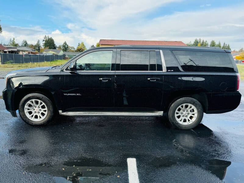 Used 2015 GMC Yukon XL SLE with VIN 1GKS2GKC7FR170450 for sale in Tacoma, WA