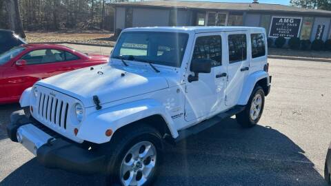 2013 Jeep Wrangler Unlimited for sale at AMG Automotive Group in Cumming GA