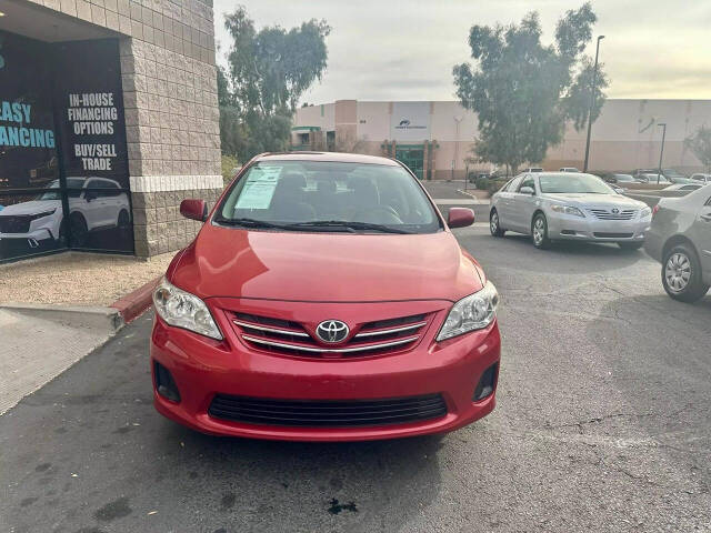 2013 Toyota Corolla for sale at HUDSONS AUTOS in Gilbert, AZ