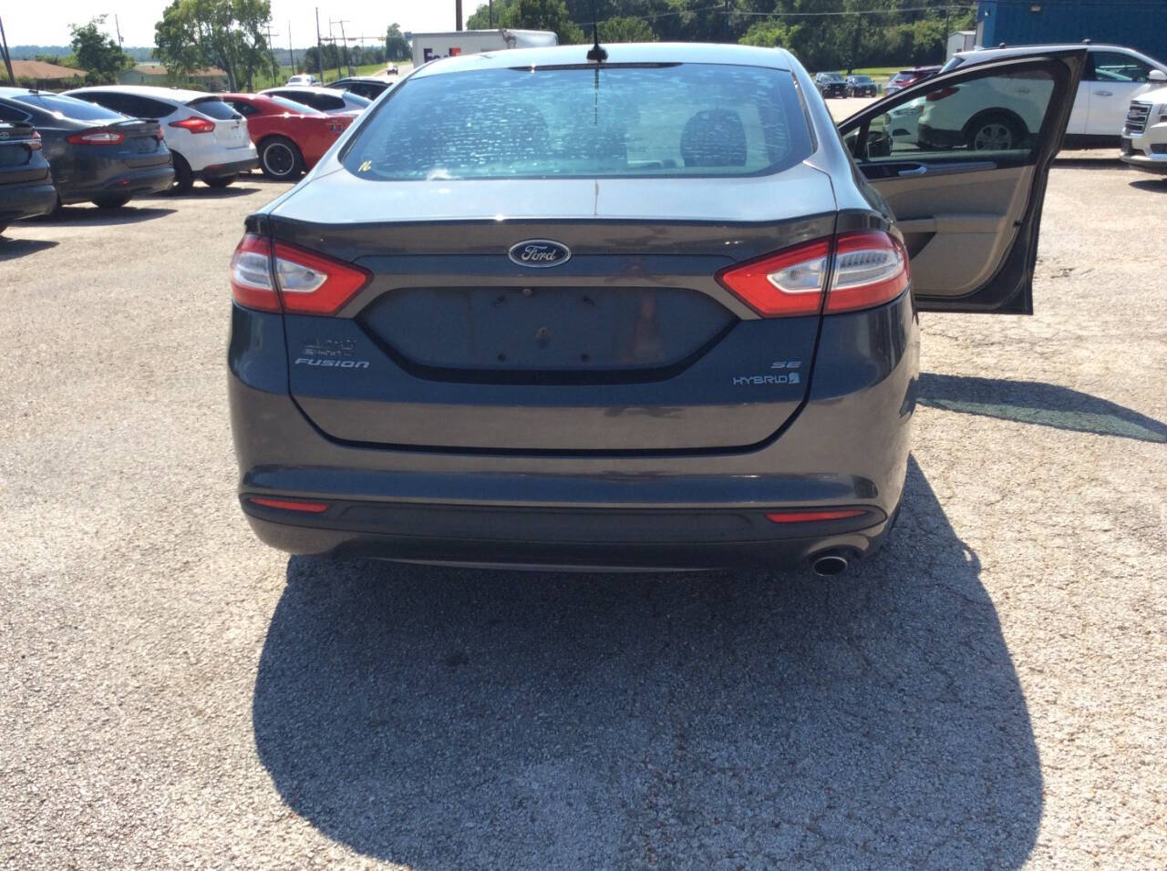 2016 Ford Fusion Hybrid for sale at SPRINGTIME MOTORS in Huntsville, TX