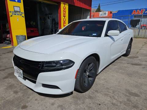 2015 Dodge Charger for sale at FM AUTO SALES in El Paso TX