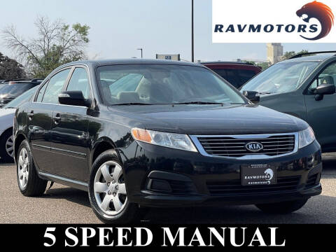 2010 Kia Optima for sale at RAVMOTORS- Burnsville in Burnsville MN