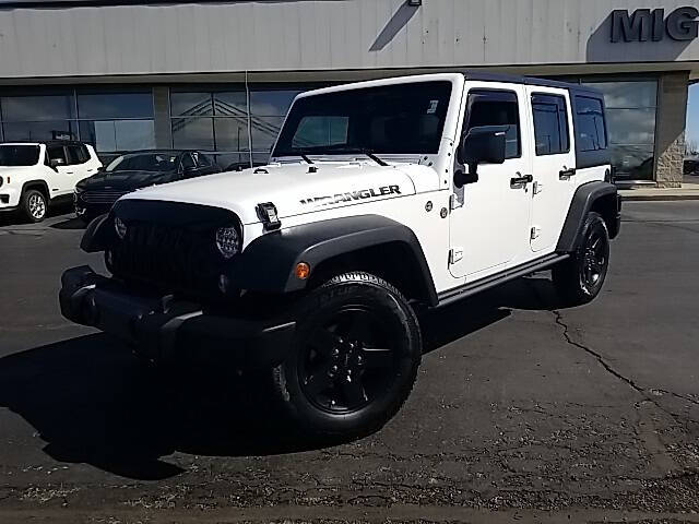 Used 2016 Jeep Wrangler Unlimited Black Bear with VIN 1C4BJWDG0GL144558 for sale in Bellefontaine, OH