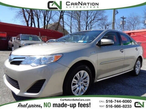 2014 Toyota Camry Hybrid for sale at CarNation AUTOBUYERS Inc. in Rockville Centre NY
