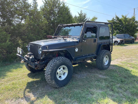 1999 Jeep Wrangler for sale at CAVENDER MOTORS in Van Alstyne TX