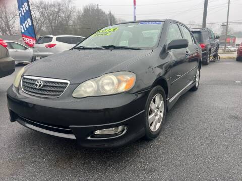 2007 Toyota Corolla for sale at Cars for Less in Phenix City AL