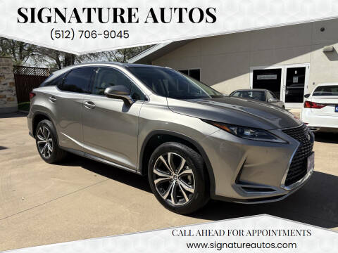 2021 Lexus RX 450h for sale at Signature Autos in Austin TX