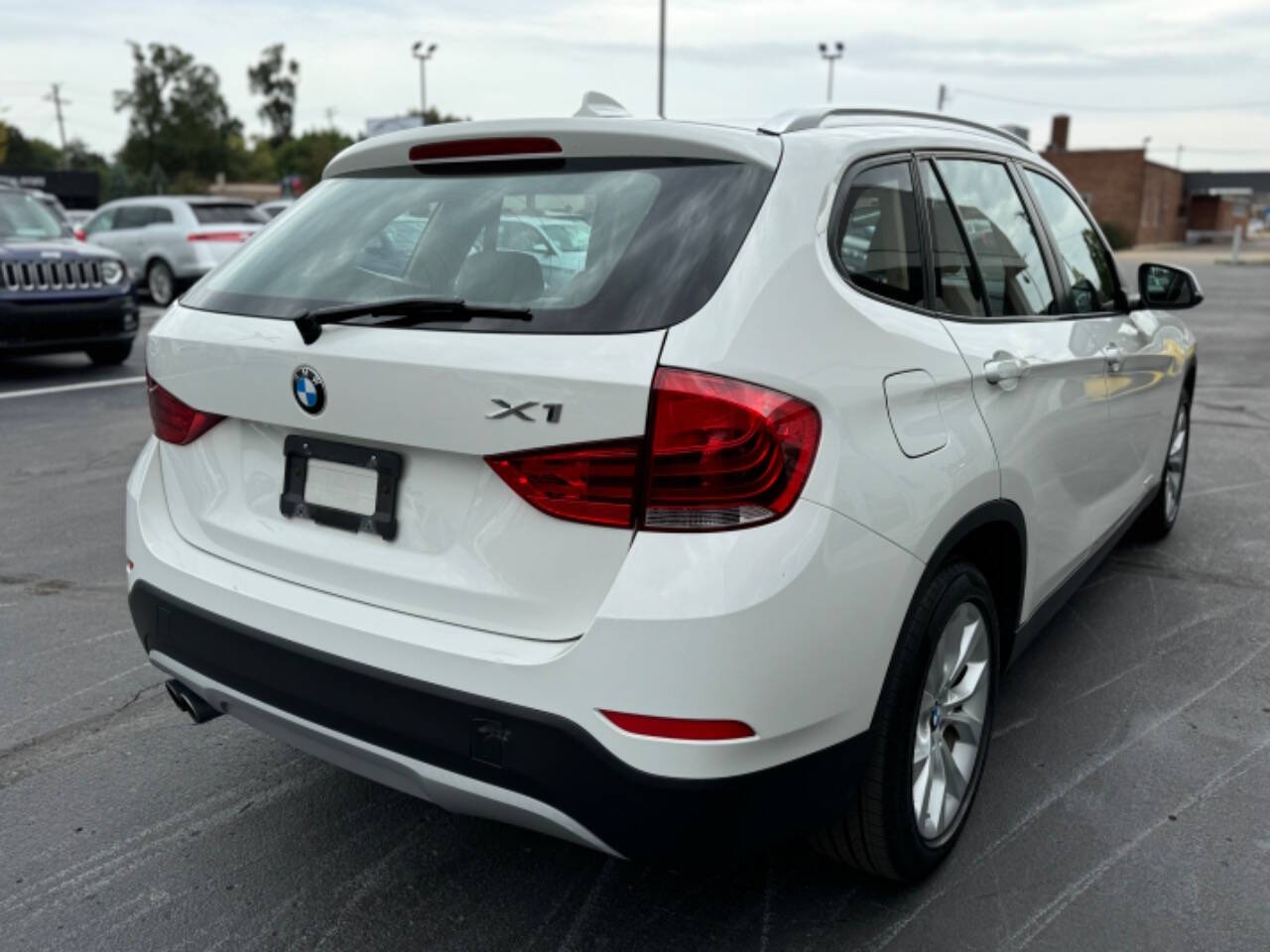 2013 BMW X1 for sale at Opus Motorcars in Utica, MI