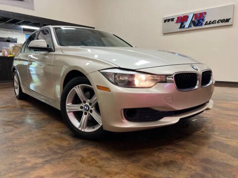 2014 BMW 3 Series for sale at Driveline LLC in Jacksonville FL