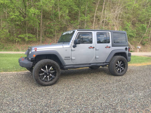 2016 Jeep Wrangler Unlimited for sale at DONS AUTO CENTER in Caldwell OH