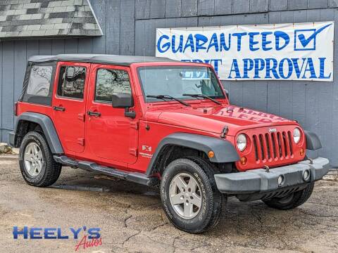 2009 Jeep Wrangler Unlimited for sale at Heely's Autos in Lexington MI