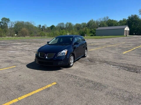 2009 Pontiac Vibe for sale at Caruzin Motors in Flint MI