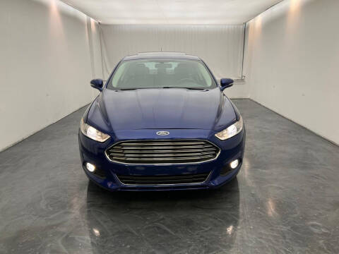 2013 Ford Fusion for sale at Roman's Auto Sales in Warren MI