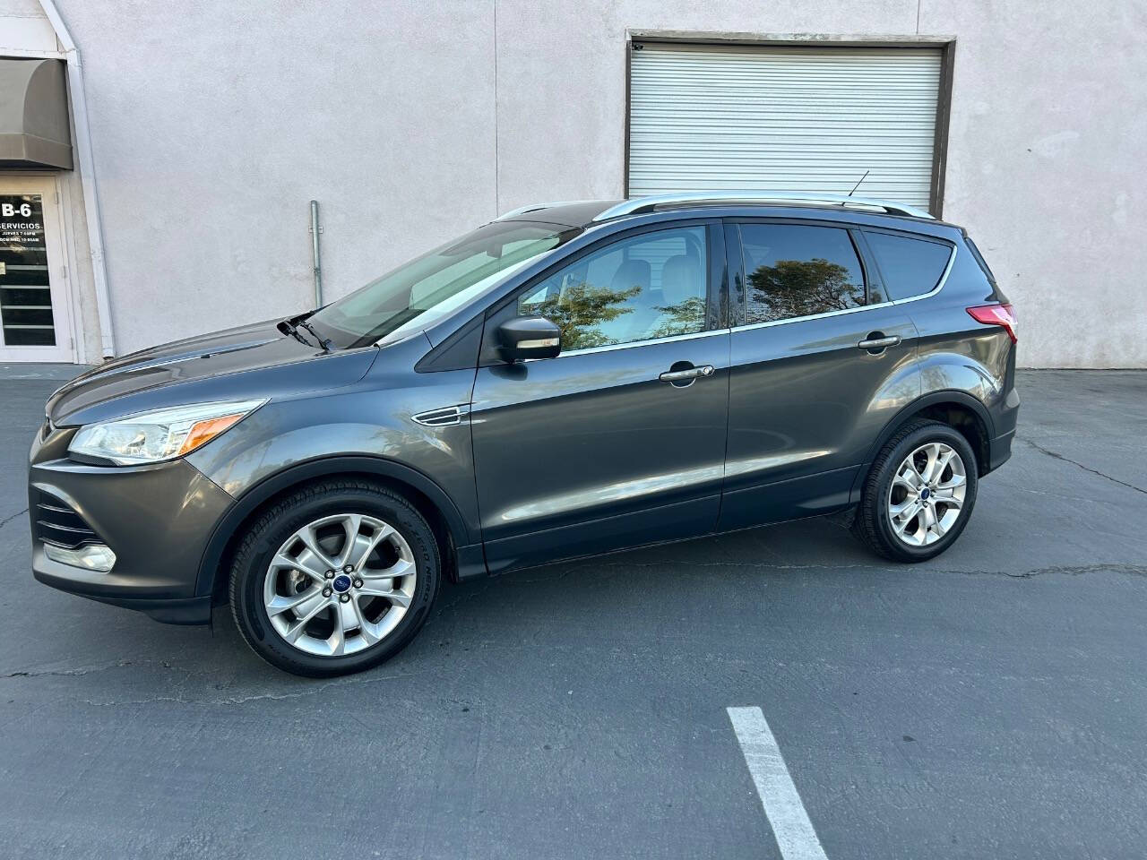 2016 Ford Escape for sale at STM AUTO GROUP LLC in Corona, CA