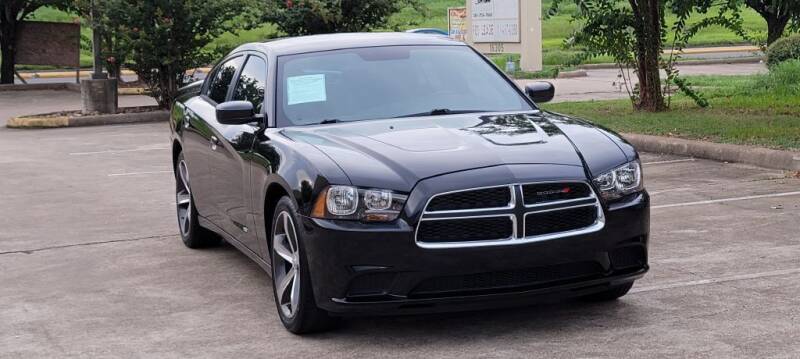 2014 Dodge Charger for sale at America's Auto Financial in Houston TX