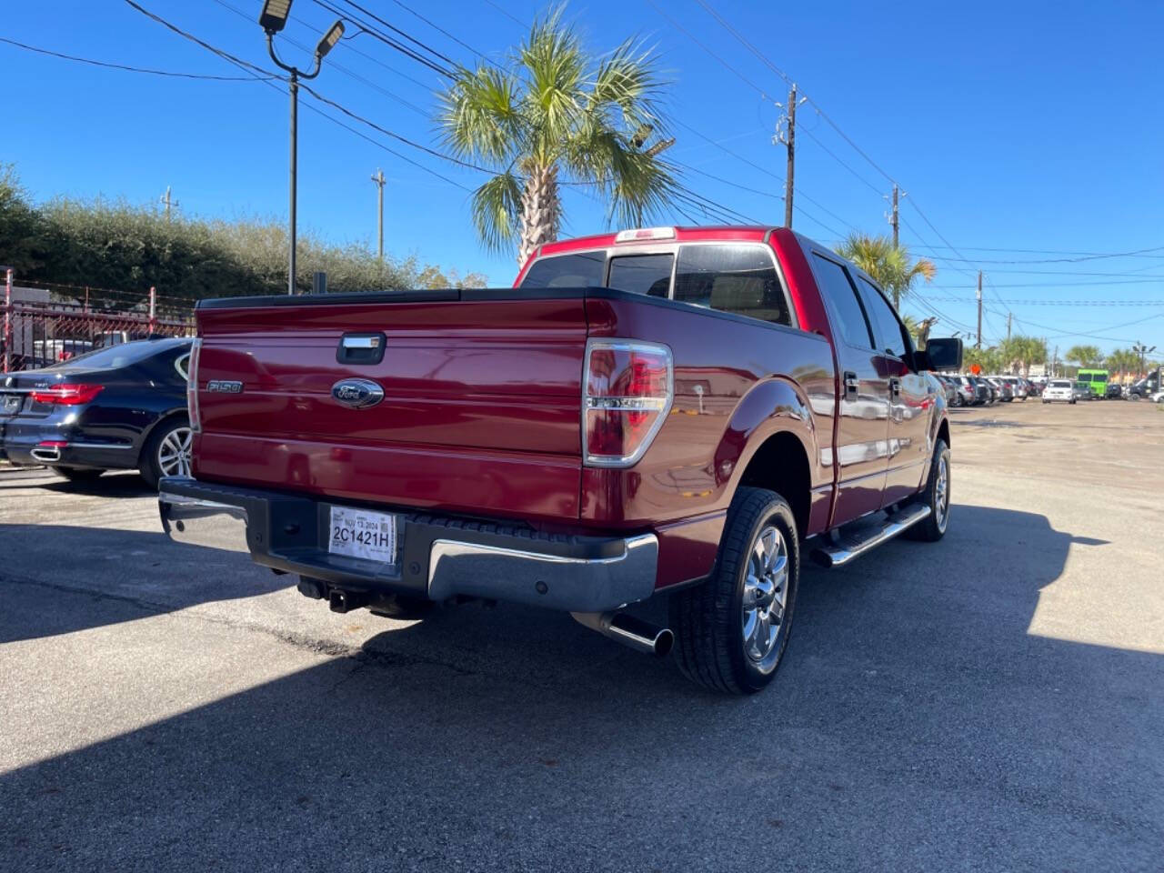 2014 Ford F-150 for sale at SMART CHOICE AUTO in Pasadena, TX