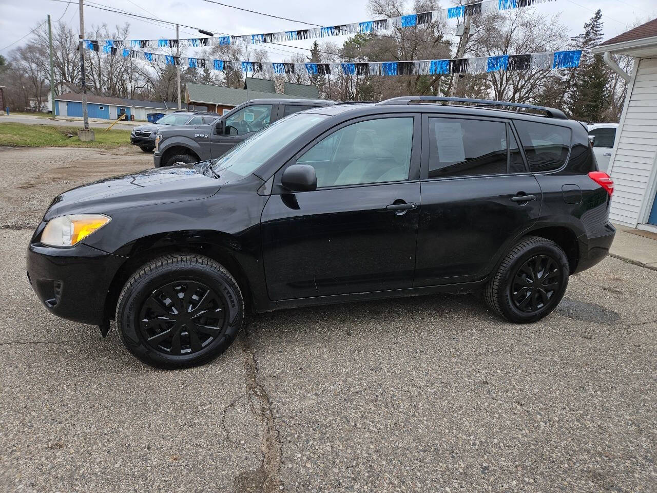 2011 Toyota RAV4 for sale at DANGO AUTO SALES in HOWARD CITY, MI