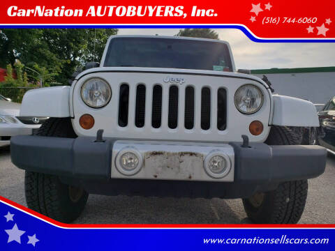 2012 Jeep Wrangler Unlimited for sale at CarNation AUTOBUYERS Inc. in Rockville Centre NY
