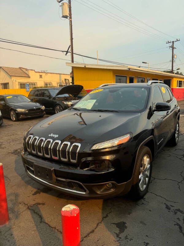 2014 Jeep Cherokee for sale at CROWN AUTO INC, in South Gate CA