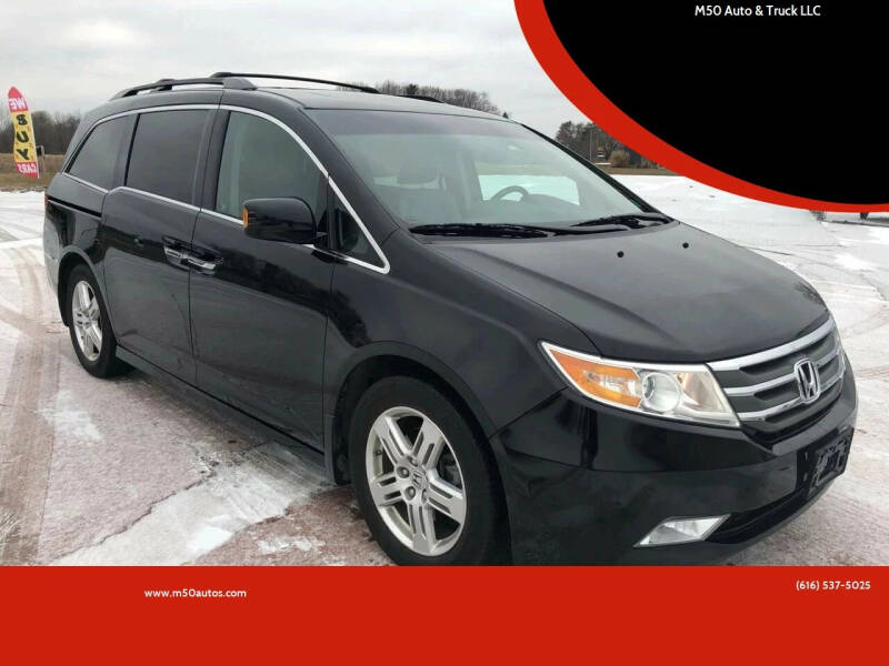 2011 Honda Odyssey for sale at Icon Auto Group in Lake Odessa MI