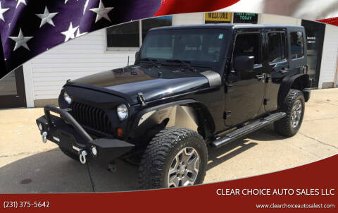 2010 Jeep Wrangler Unlimited for sale at Clear Choice Auto Sales LLC in Twin Lake MI