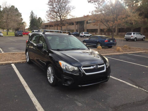 2012 Subaru Impreza for sale at QUEST MOTORS in Englewood CO