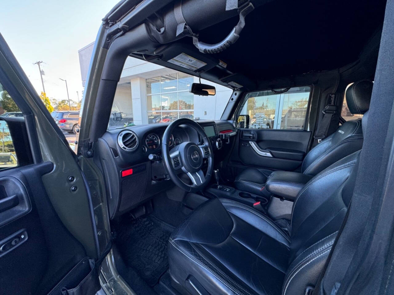 2015 Jeep Wrangler for sale at Opus Motorcars in Utica, MI