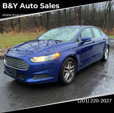 2013 Ford Fusion for sale at B&Y Auto Sales in Hasbrouck Heights NJ