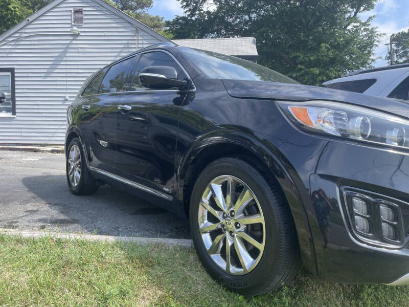 Used 2017 Kia Sorento SXL with VIN 5XYPKDA51HG187667 for sale in Roswell, GA